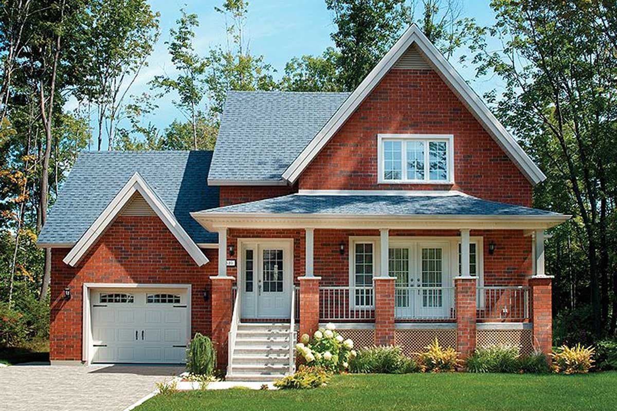 House plan exterior: Two-story brick home with attached garage, covered front porch with columns, and gabled dormers.