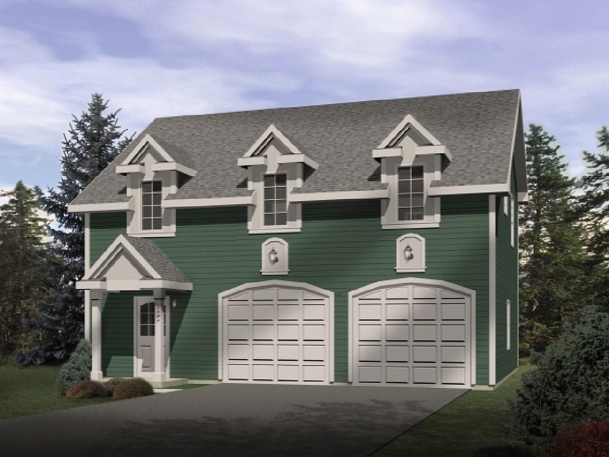 Two-story house plan exterior with green siding, dormer windows, and a two-car garage.