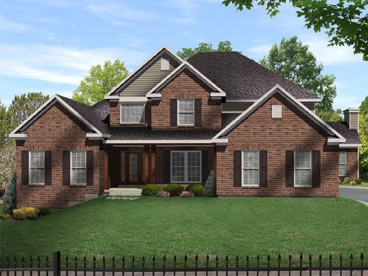 House plan exterior: Two-story brick home with a covered front porch, multiple gables, dormers, and shutters.