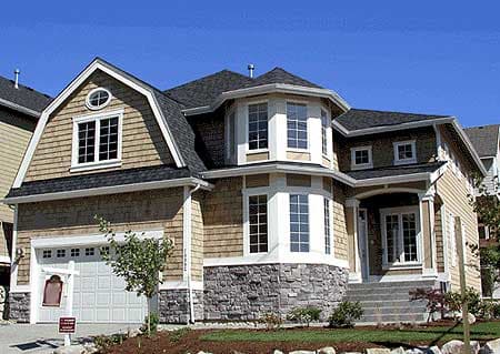 House plan exterior with gambrel dormer, stone base, octagonal bay window, and covered entry.