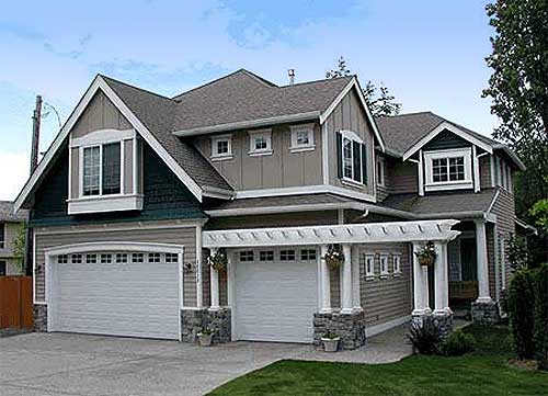 House plan exterior: Two-story Modern Farmhouse with a triple garage, covered pergola, and dormer windows.