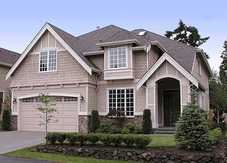 House plan exterior featuring a two-story design with shingle siding, arched entryway, prominent gables, and a multi-window garage.