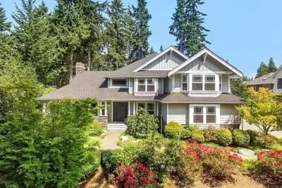 Classic Newport-style House Plan with Corner Wrapping Porch