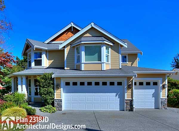 House plan exterior: two-story home with a prominent bay window, covered porch, and a double and single garage.