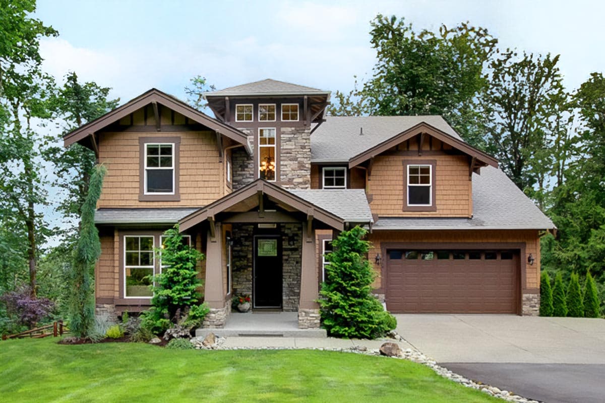 Craftsman house plan exterior. Two-story home with gabled roof, stone accents, and covered front entry. Features an attached garage.