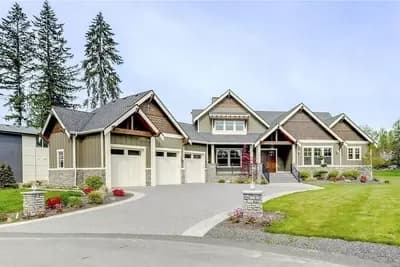 4-Bed Craftsman House Plan with 3-Car Angled Garage 