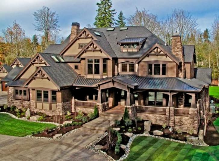 House plan exterior, Craftsman style, two stories, with prominent gables, stone accents, and a covered front porch.