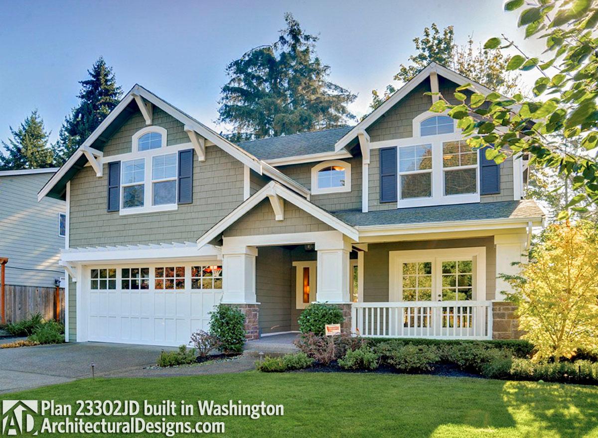House plan exterior: Two-story Modern Farmhouse with gables, dormers, a covered porch, and a two-car garage.