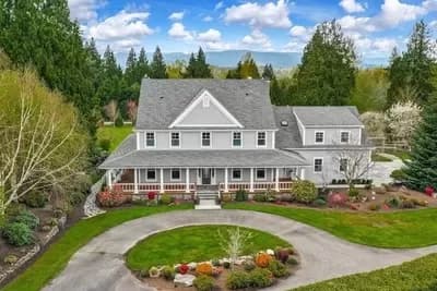 5-Bed Luxurious Farmhouse Plan with Full Wrap-Around Porch