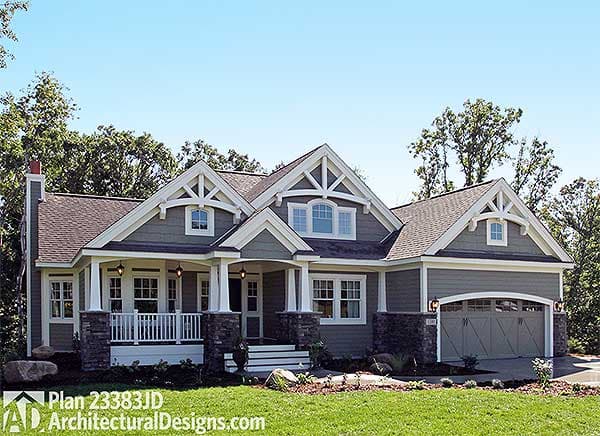 Craftsman house plan exterior with gabled dormers, stone accents, and a wraparound porch. One story.