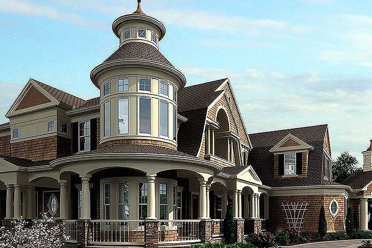 House plan exterior with a prominent turret, wraparound porch, dormers, and varied rooflines.