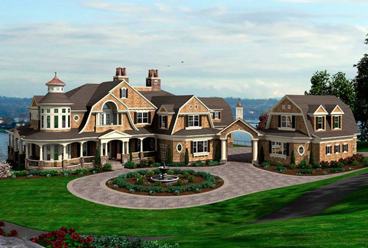 House plan exterior: complex multi-story design with shingled gables, porte-cochère, and a central rotunda.