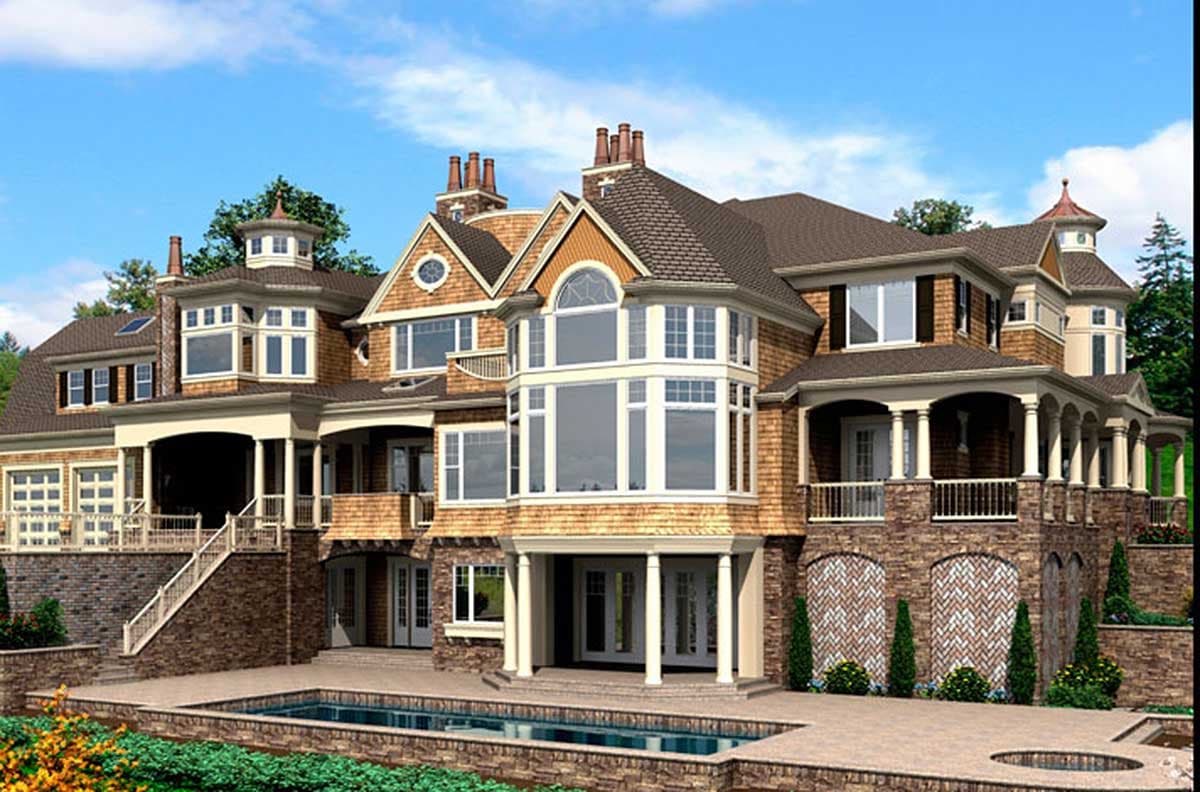House plan exterior with multiple gables, arched window, cupola, covered porches, and stone and shingle siding.