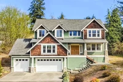 Elevated Craftsman House Plan for a Front Sloping Lot