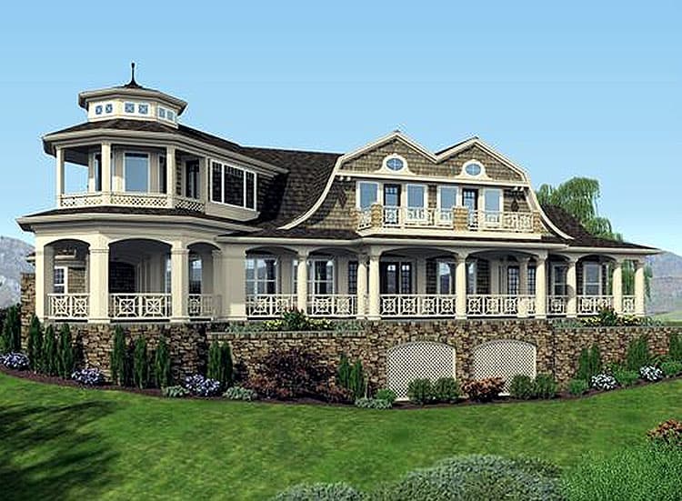 House plan exterior featuring a turret, wraparound porch with columns, multiple gables, and stone foundation.