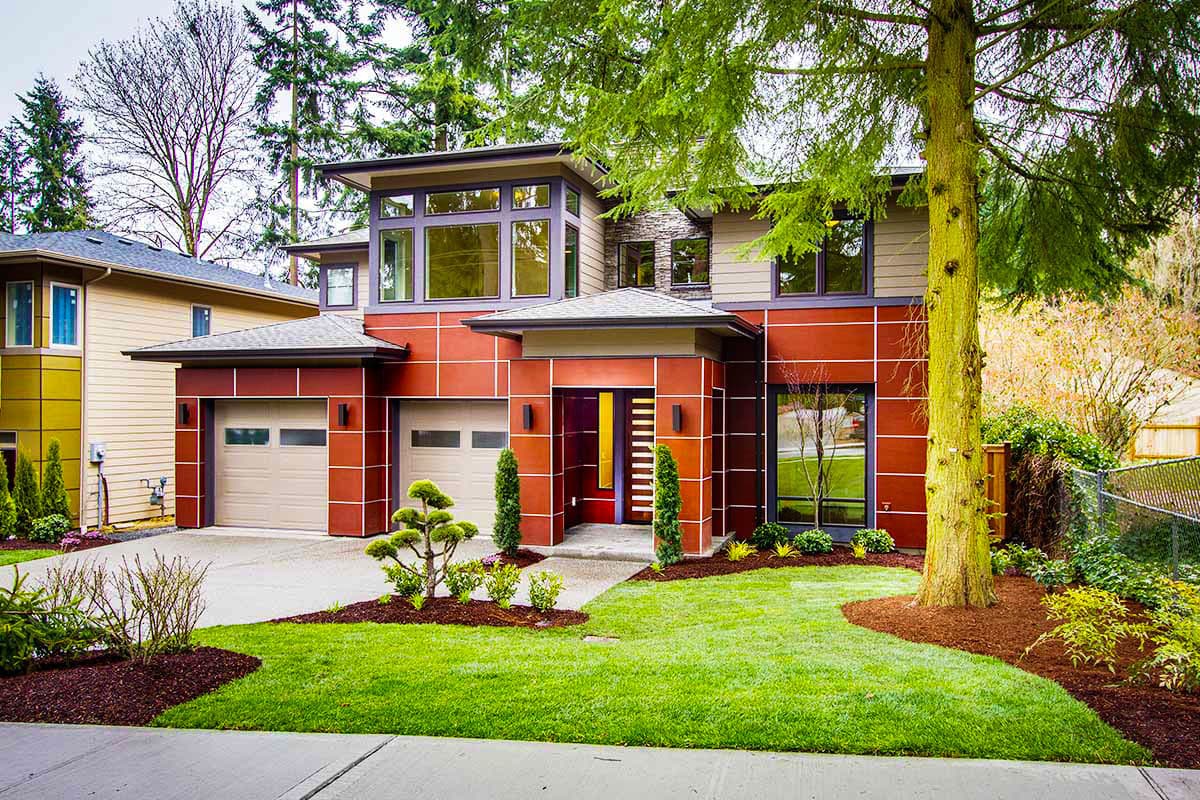 House plan exterior featuring a two-story Modern style with flat rooflines, a two-car garage, and large windows. Includes a covered entry.