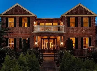 Traditional Home Plan with Stunning Balcony Bridge