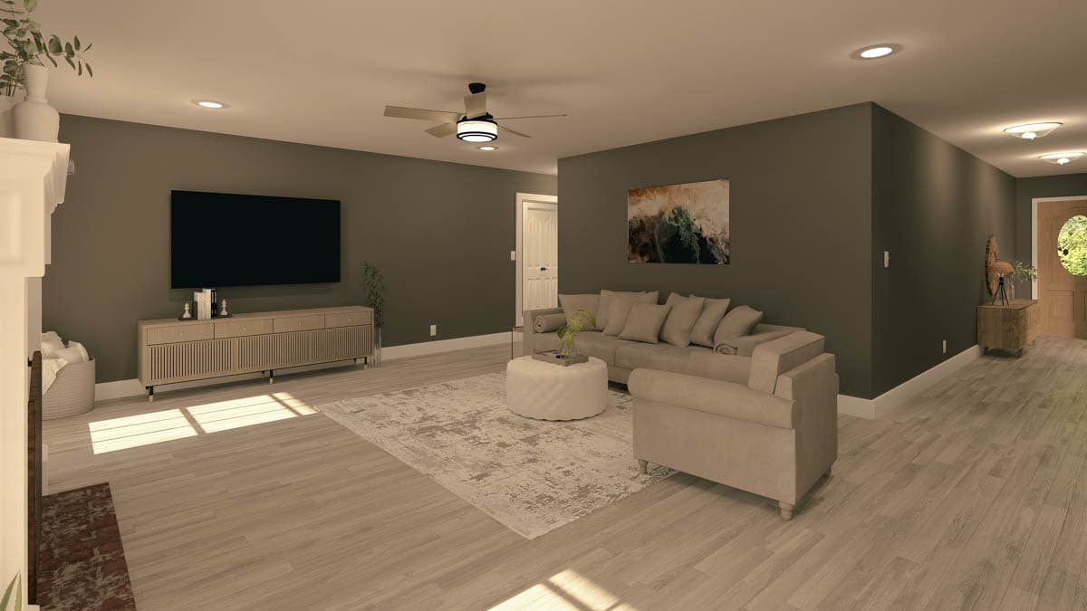 Interior rendering of a great room with sectional sofa, ottoman, entertainment center, and fireplace.