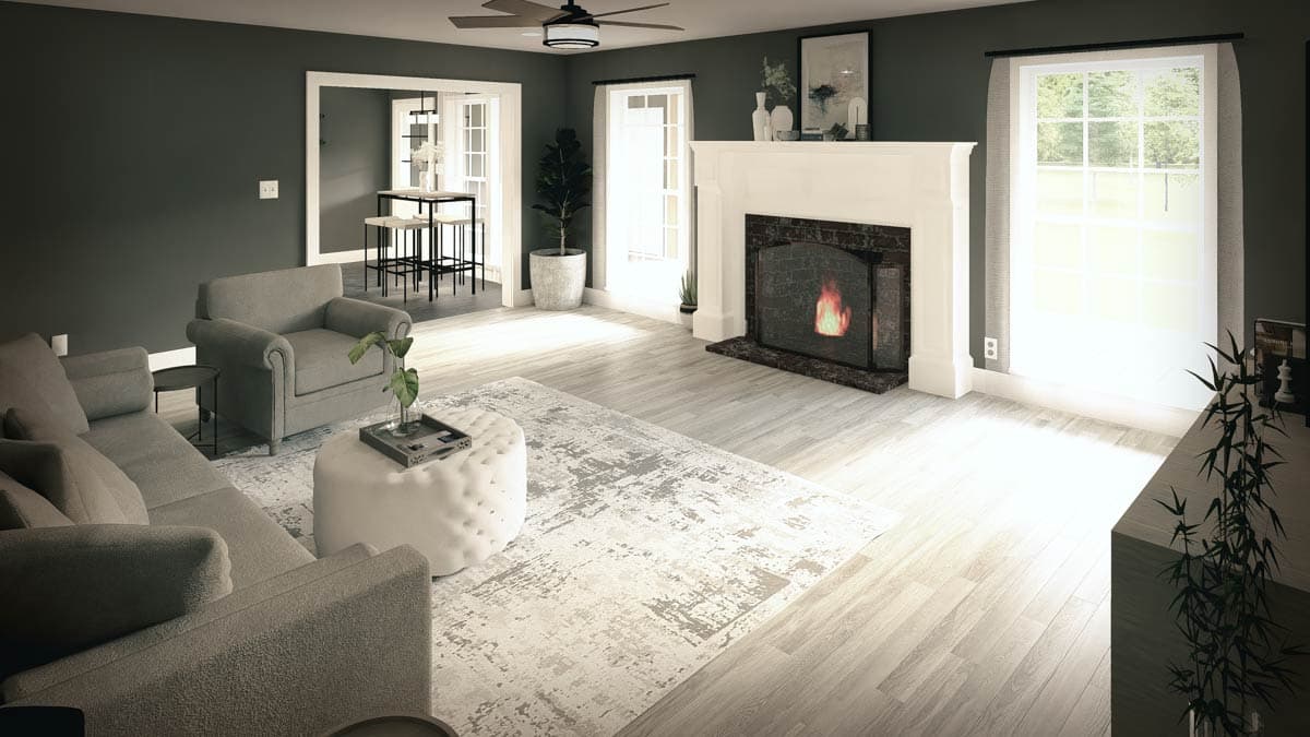 Living room with fireplace, plush seating, and dining area visible through doorway. Wood flooring.