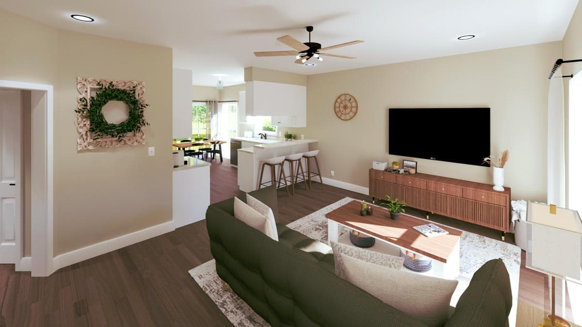 Rendering of an open-concept living room with a sofa, coffee table, entertainment center, and a kitchen with island seating.