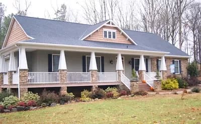 Wraparound with Porch and Sunroom in Back