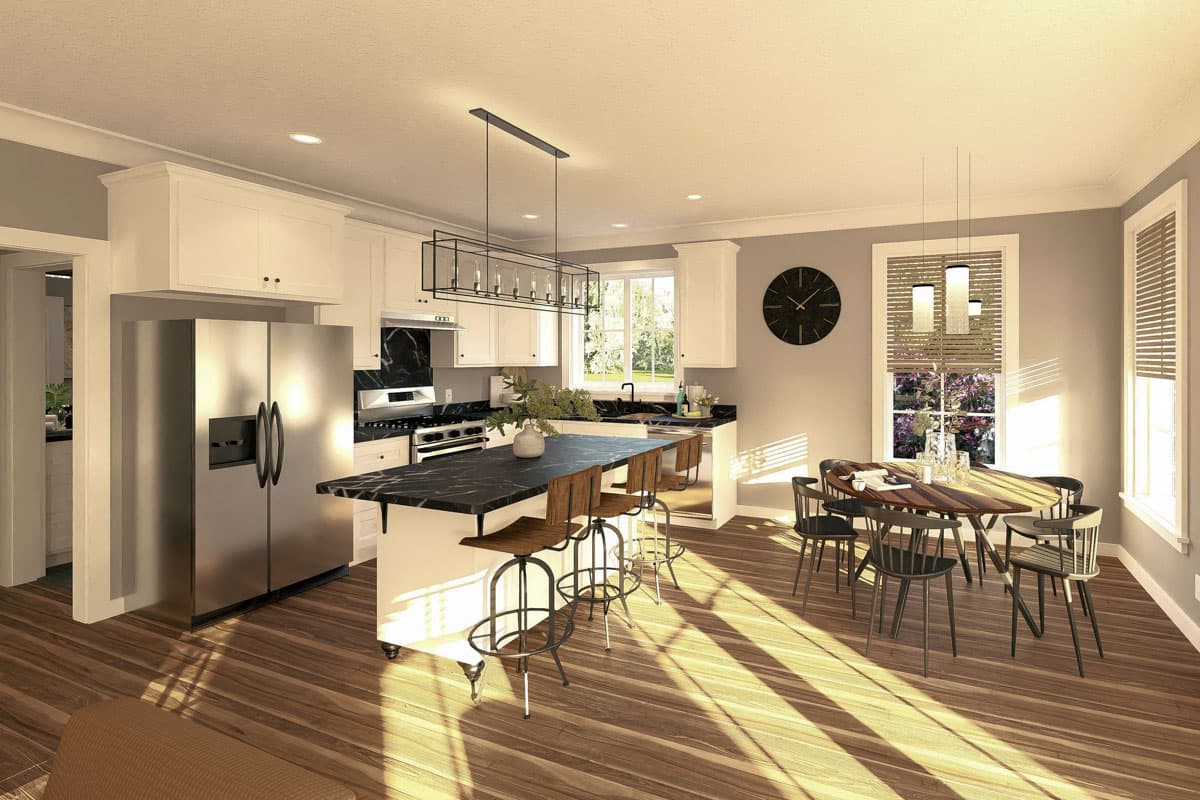 Open concept kitchen and dining area with a large island, stainless steel appliances, and natural light.