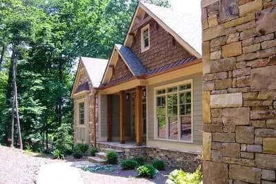 Rustic Style Ranch House Plan for a Rear-Sloping Lot