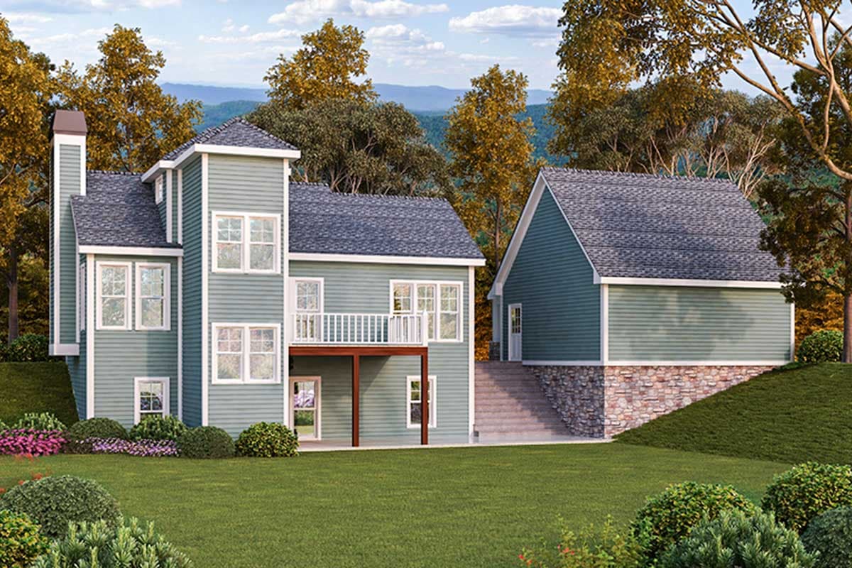 House plan exterior of a multi-story home with a gabled garage. Features include a prominent chimney, second-story balcony, and stone foundation.