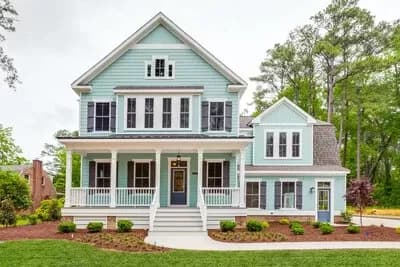 Open Floor Plan Farmhouse with a Main Floor Home Office and Convenient Laundry Upstairs