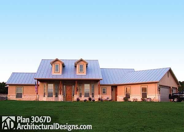 Plan 3067D house plan exterior: One-story Modern Farmhouse with metal roof, prominent dormers, covered porch, and attached two-car garage.