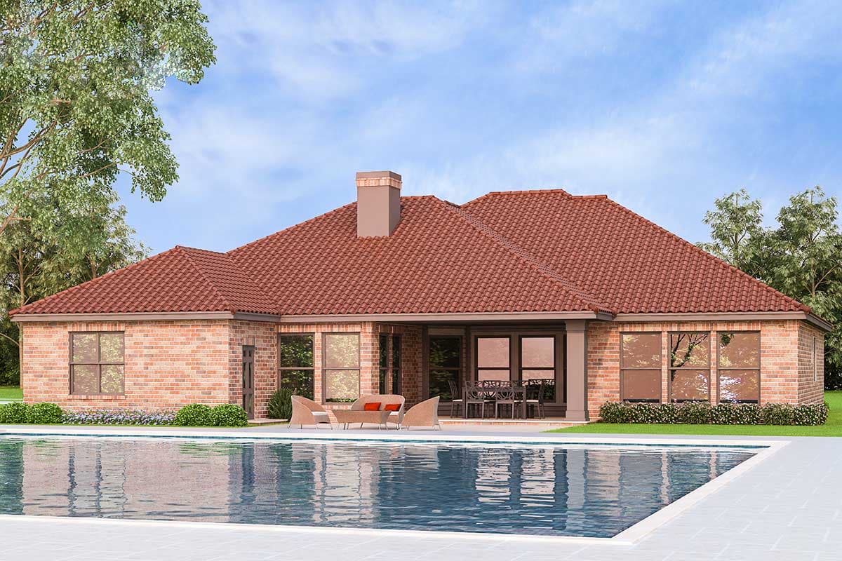 House plan exterior: Single-story brick home with red tile roof, large windows, covered patio, and fireplace chimney.