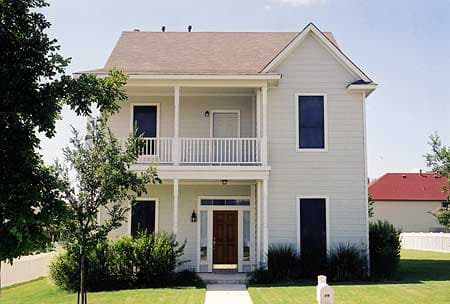 House plan exterior: Two-story home with covered front porch, balcony, gabled roof, and multiple windows.