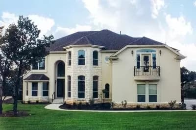 Hill Country House Plan with Two-Story Family Room