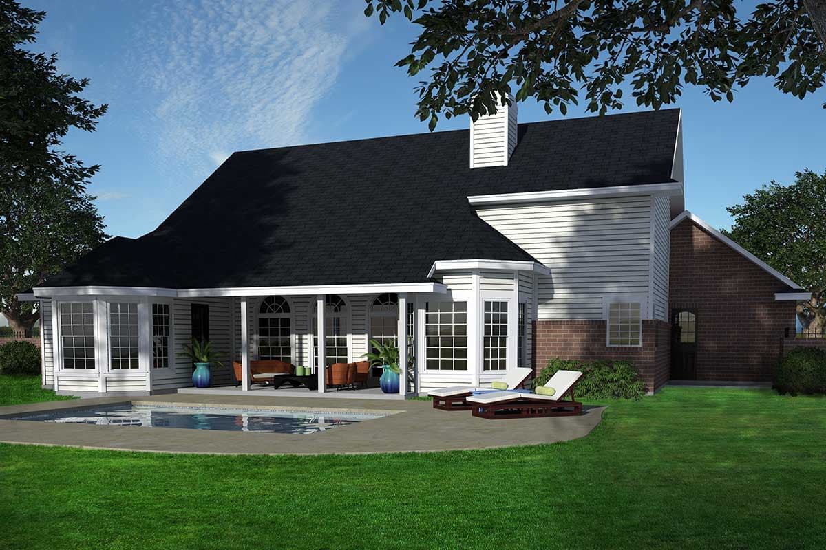House plan exterior with covered porch, bay windows, black roof, and brick base. Features a swimming pool and deck.