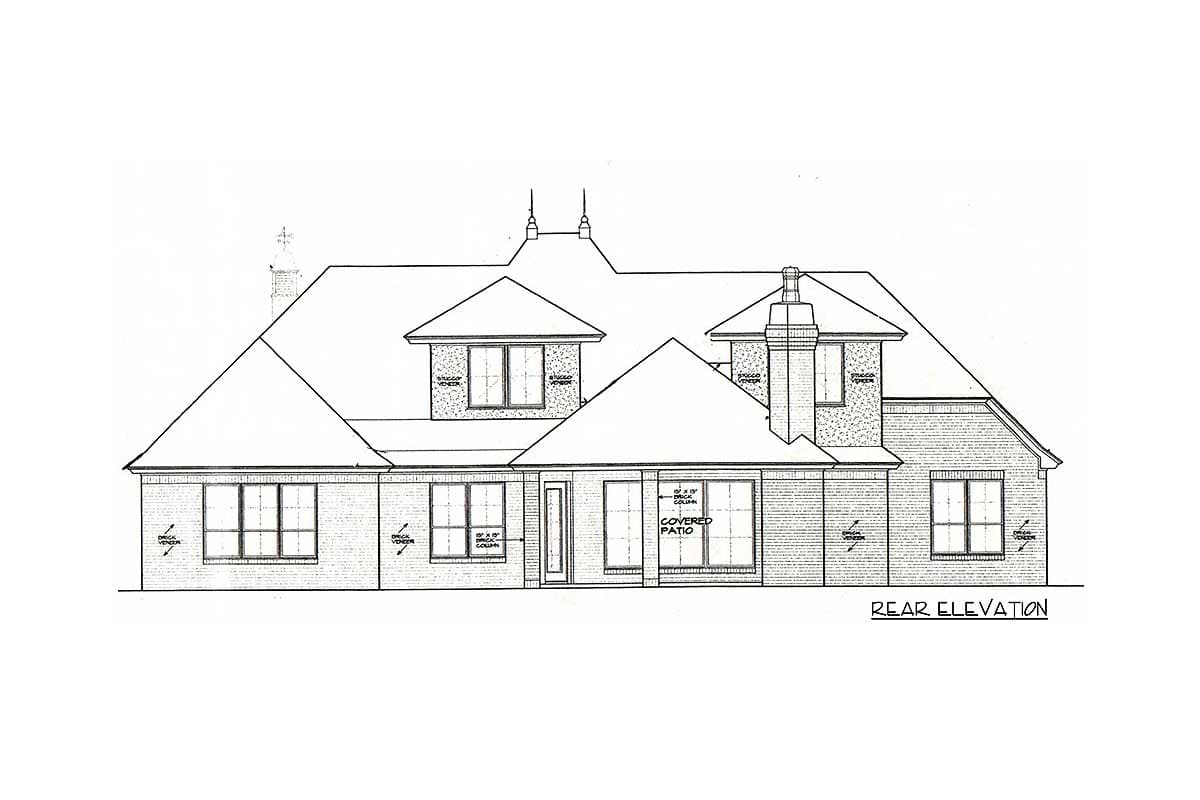 Rear elevation drawing of a house plan featuring a covered patio, multiple gables, and a prominent brick chimney.