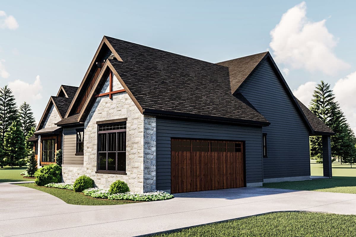 House plan exterior: Two-story Modern Farmhouse with stone accents, prominent gables, and a two-car garage.