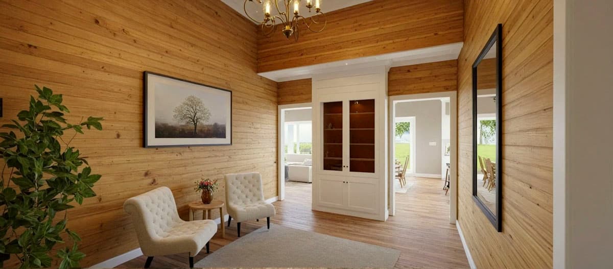 Interior view of a room with wood-paneled walls, two upholstered chairs, a built-in cabinet with glass doors, and doorways to other rooms.