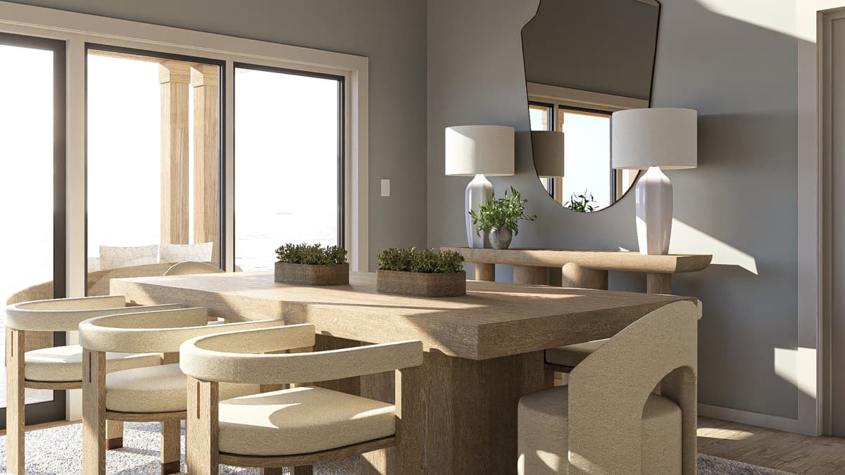 Dining room with large wooden table and chairs, console table with lamps, and wall mirror, overlooking large windows.