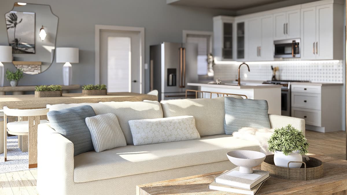 Interior rendering of an open-concept living area and kitchen with a sofa, dining table, and white cabinetry.