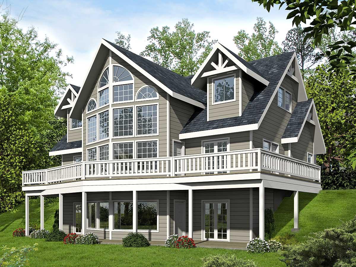 House plan exterior with multiple gables, a wraparound deck, and a large multi-story window arrangement.