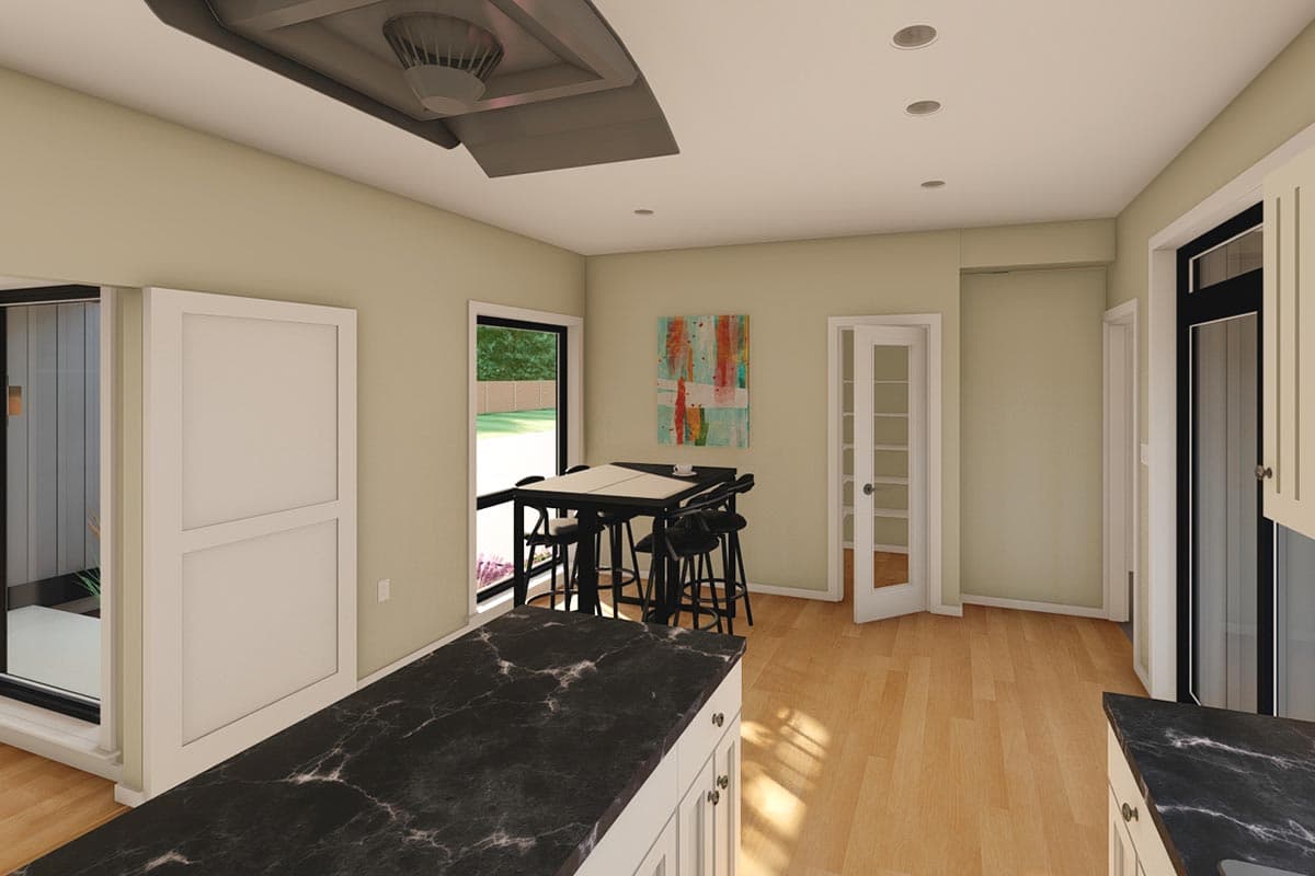 Modern kitchen with marble island, high-top table, and doors to outside and pantry.