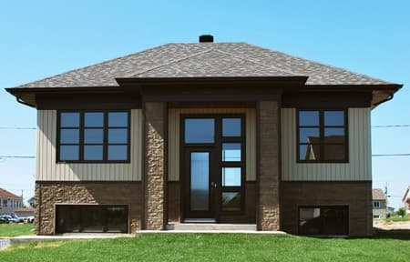 House plan exterior with stone and vertical siding, prominent central entrance with modern door and windows.