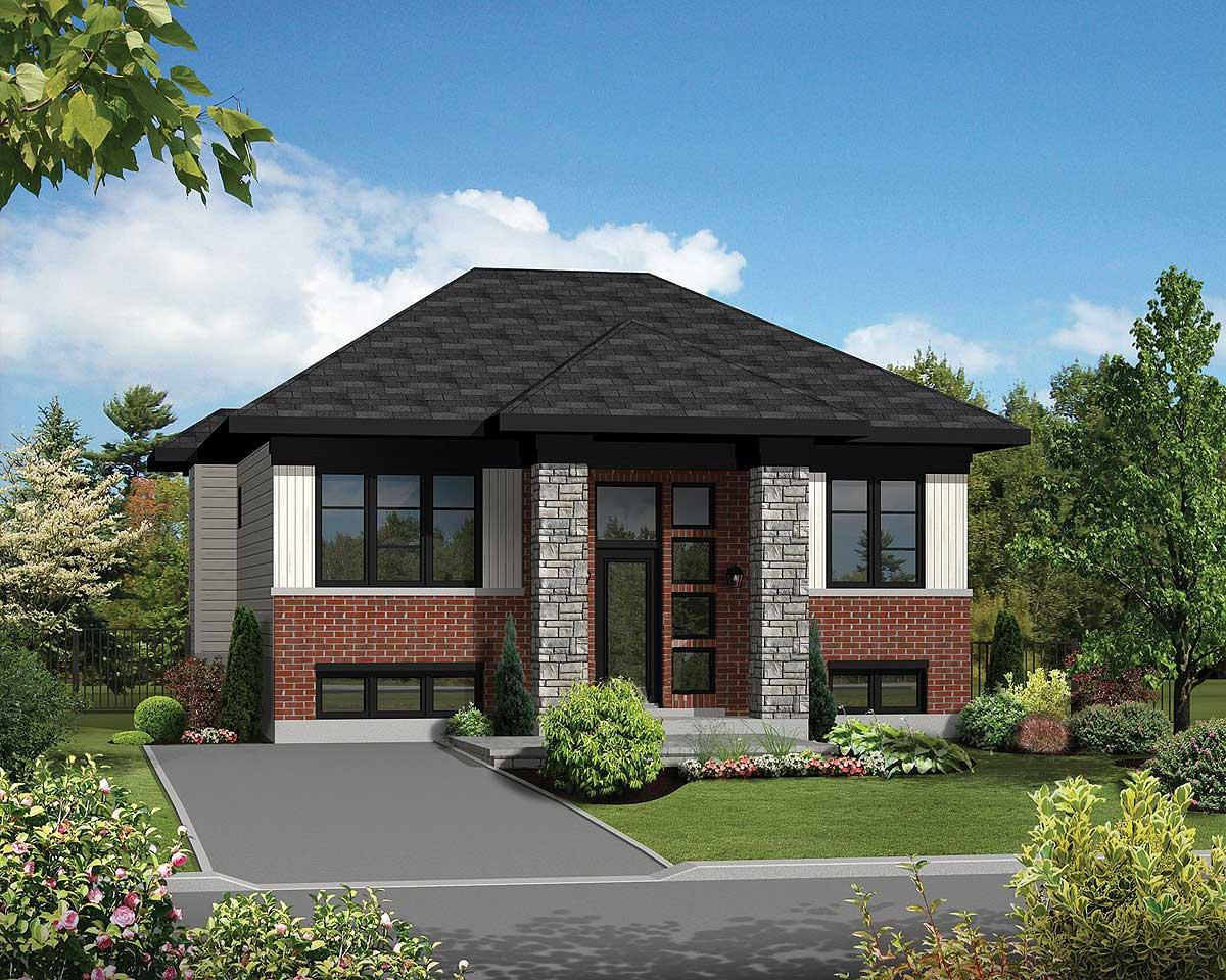 House plan exterior with brick and stone facade, large windows, and a steeply pitched roof.