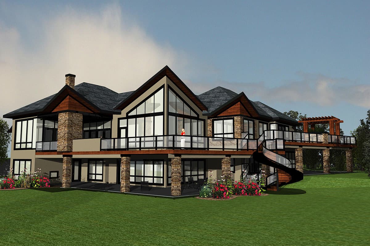 Modern house plan exterior with stone accents, multiple gables, large windows, and a prominent spiral staircase leading to a deck with a pergola.