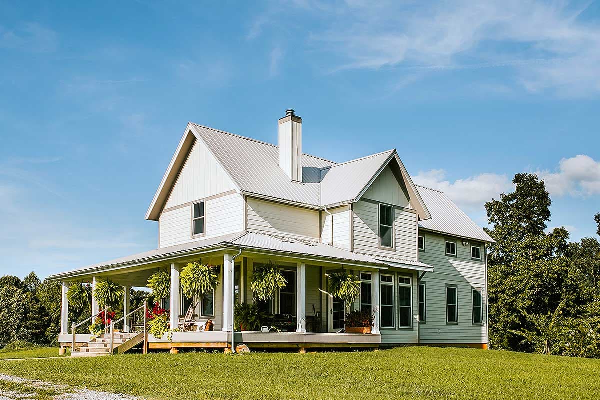Modern Farmhouse house plan exterior with wrap-around porch, metal roof, and multiple gables.
