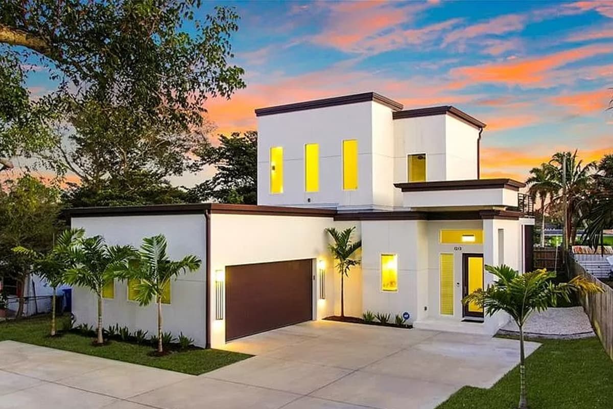 House plan exterior featuring a modern design, two stories, flat roof, and attached garage. Includes accent windows and minimalist entry.