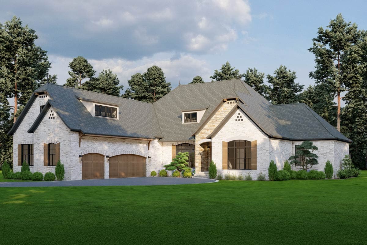 House plan exterior. Two-story with gabled roof, dormers, and stone accents. Features include arched windows and an attached garage.