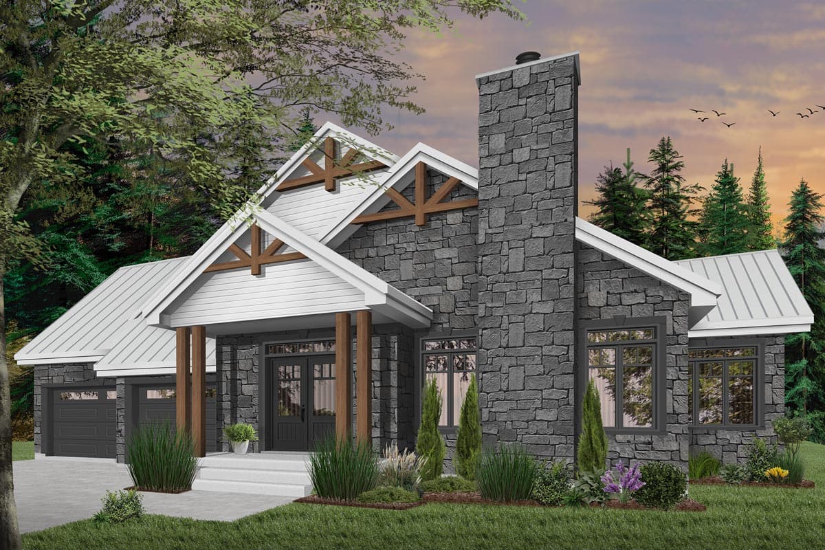 A stone-clad house with a white gabled roof, wooden beams, and a tall chimney. Trees surround the home set against a sunset sky.