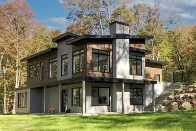 Mid-Century Modern Multi-Generational House Plan for a Sloping Lot