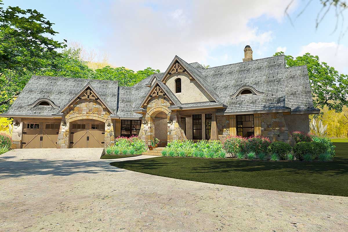 House plan exterior with stone facade, arched entry, multiple gables, dormers, and a three-car garage.